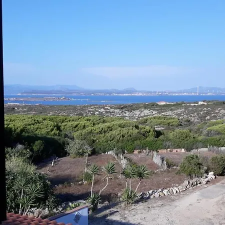 Cala Lunga Holiday بيت للعطل