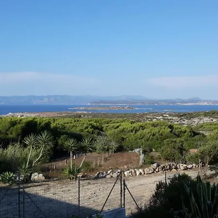 Cala Lunga Holiday بيت للعطل
