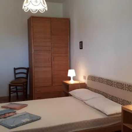 Cala Lunga Holiday بيت للعطل